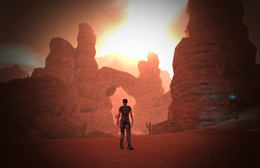 CGI of a man standing in a desert landscape facing away from the camera looking towards towering sand sculpted rock formations