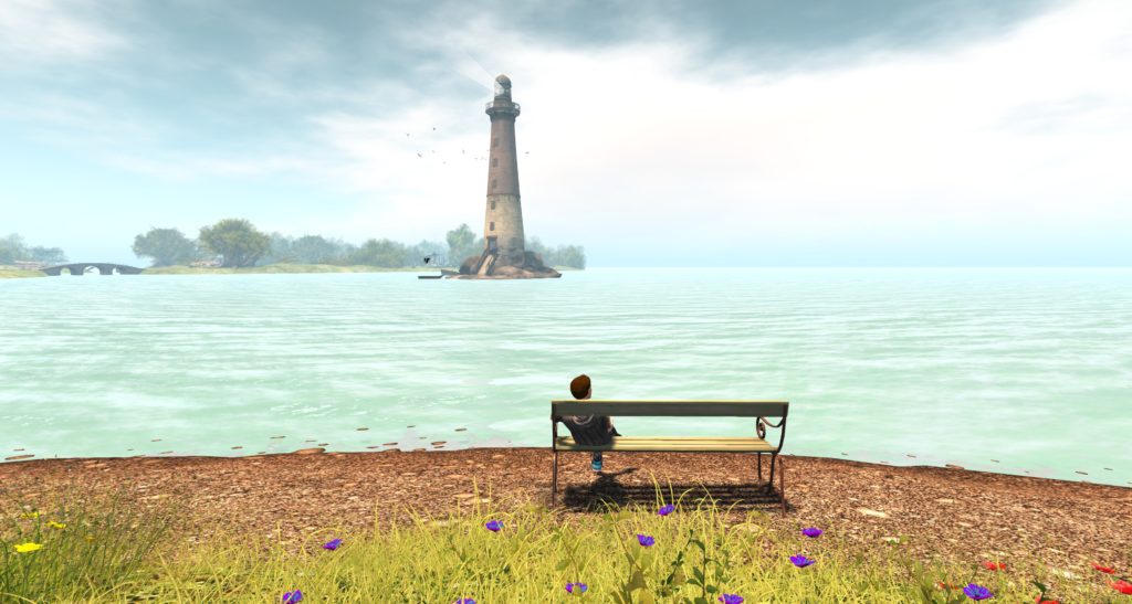 A man sat on a bench looking out across the sea towards the lighthouse in the background